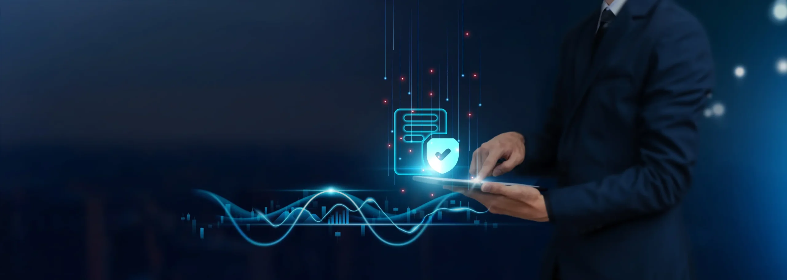 Businessperson in a suit uses a tablet with a glowing shield and checkmark, symbolizing digital security.